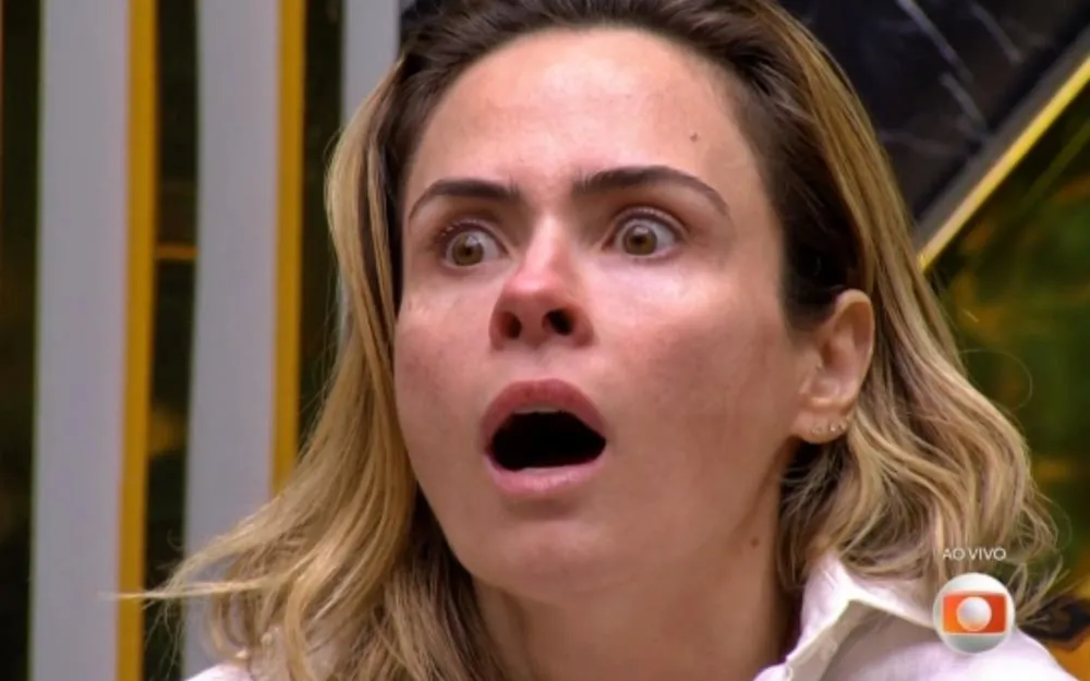 Ana Paula Renault descobrindo que o irmão de Tadeu Schmidt, Oscar, faleceu recentemente (Reprodução: Globoplay)